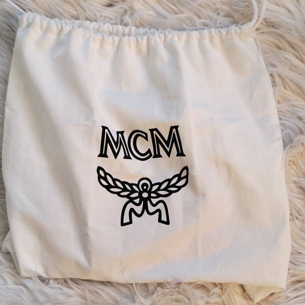 MCM Authentic cross body wallet bag
